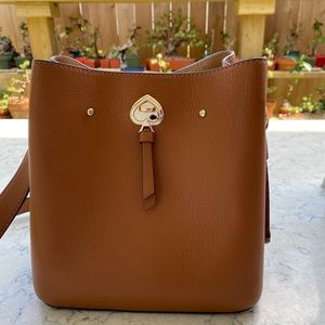 Small cognac bucket bag